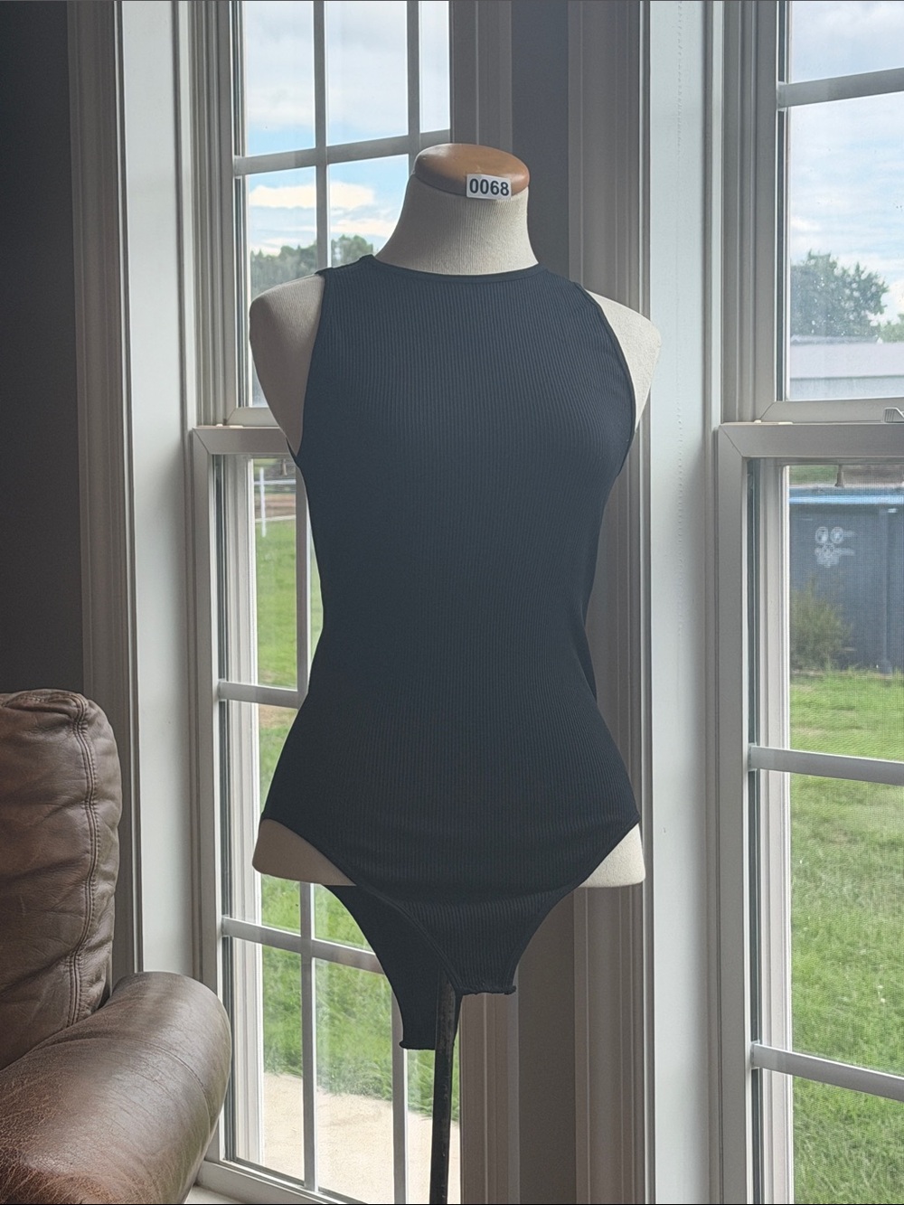 Lot of (4) Ribbed High-Neck Black Bodysuit